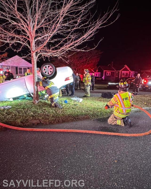 November 2025- Saturday night the Sayville Fire Department was alerted for an overturned motor vehicle on Sayville Blvd with confirmed occupant entrapment. When crews arrived, firefighters quickly went to work using our hydraulic powered vehicle extrication tools to reach the trapped occupant. With the help of Community Ambulance Company, the driver was removed, stabilized, and transported to a local hospital for further evaluation. The SFD Fire Police and SCPD assisted with traffic and crowd control.
Great teamwork by all agencies working together and making a difference in our community.
Are you interested in becoming a member of our team? The Sayville Fire Department is actively recruiting new members. For an application, visit sayvillefd.org.
